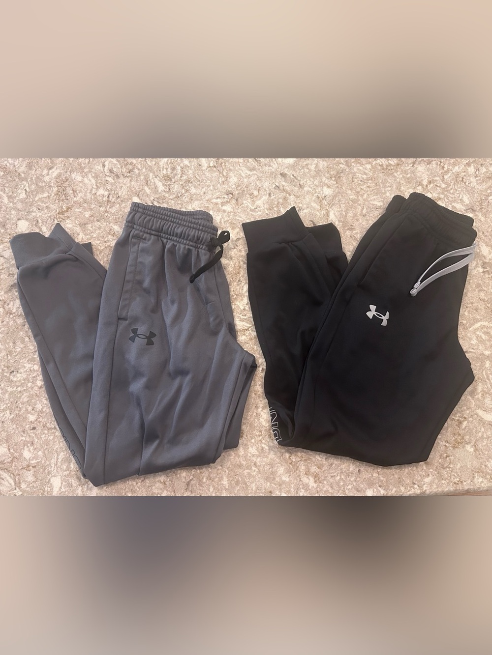Two pairs of Under Armour boys joggers